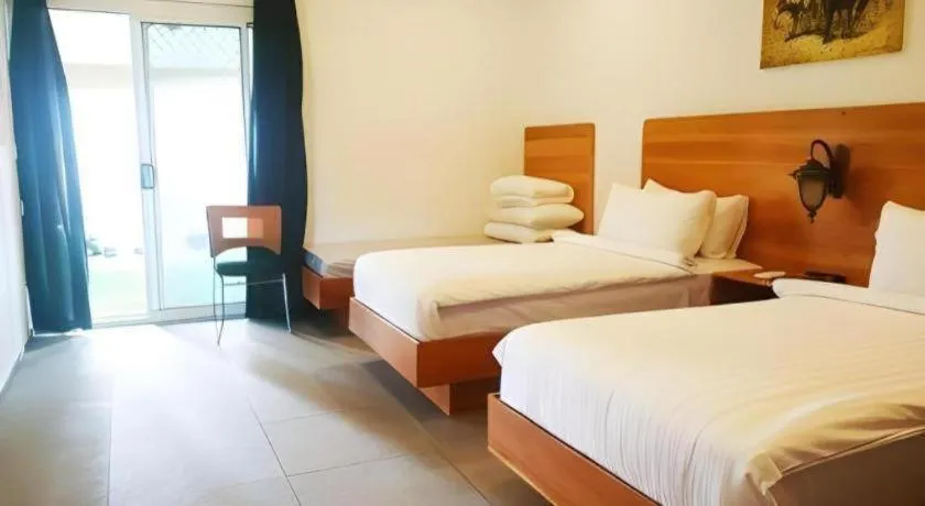 Bed in Roman Empire Panglao Boutique Resort