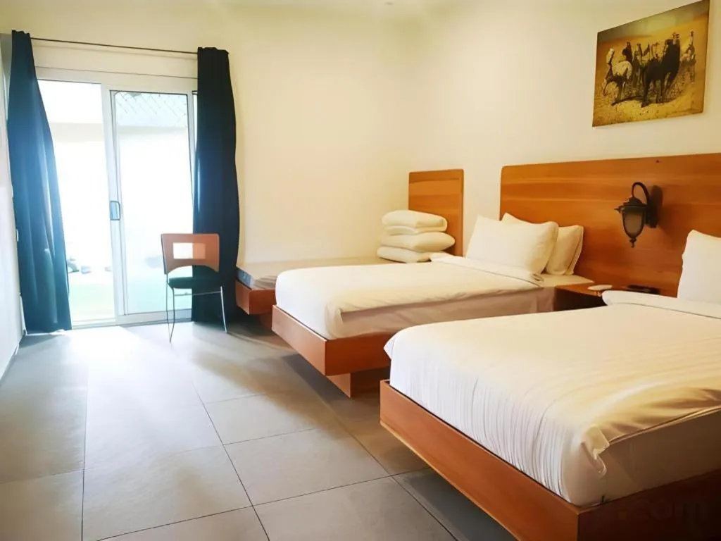 Bed in Roman Empire Panglao Boutique Resort