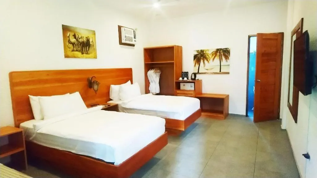 Bed in Roman Empire Panglao Boutique Resort