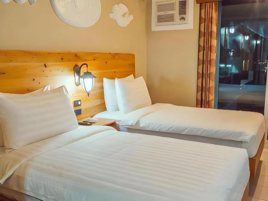 Bed in Roman Empire Panglao Boutique Resort