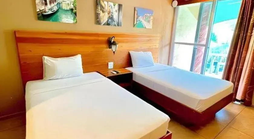 Bed in Roman Empire Panglao Boutique Resort Bed in Roman Empire Panglao Boutique Resort