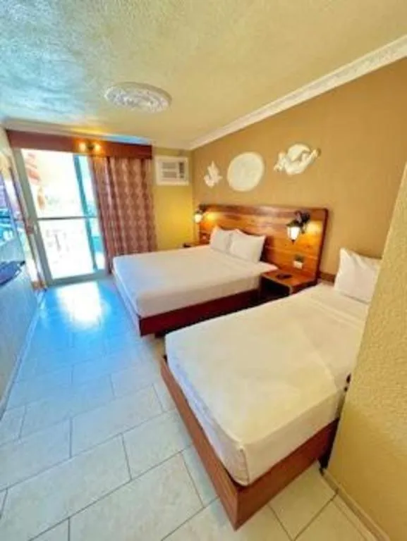 Bed in Roman Empire Panglao Boutique Resort