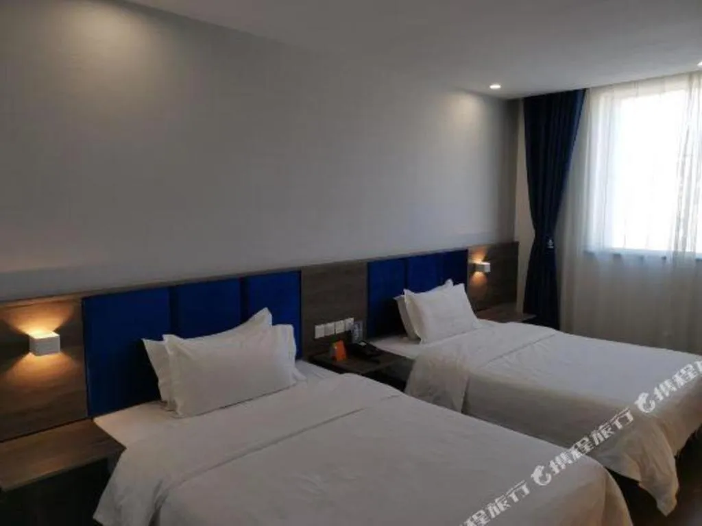 Bed in 7 Days Inn Lvliang Bus Terminal