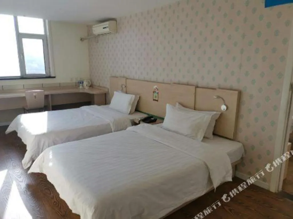 Bed in 7 Days Inn Lvliang Bus Terminal