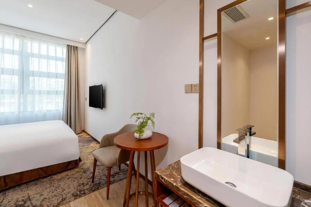 Bed in H Life Hotel (Shenzhen Sea World Branch)