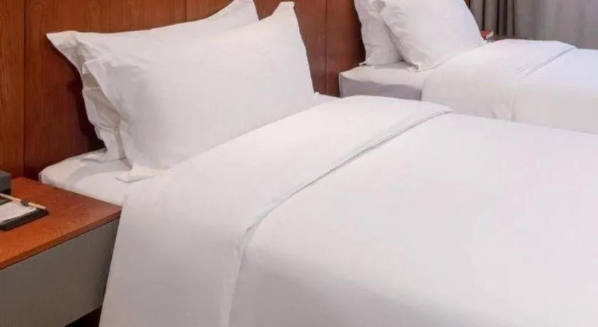 Bed in H Life Hotel (Shenzhen Sea World Branch)