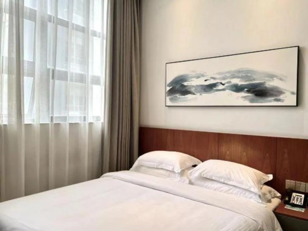 Bed in H Life Hotel (Shenzhen Sea World Branch)