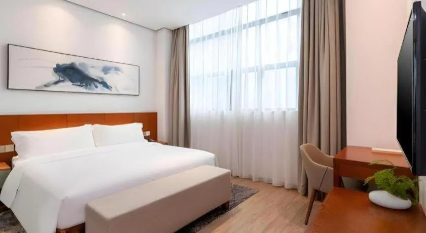 Bed in H Life Hotel (Shenzhen Sea World Branch)