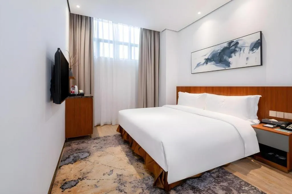 Bed in H Life Hotel (Shenzhen Sea World Branch)