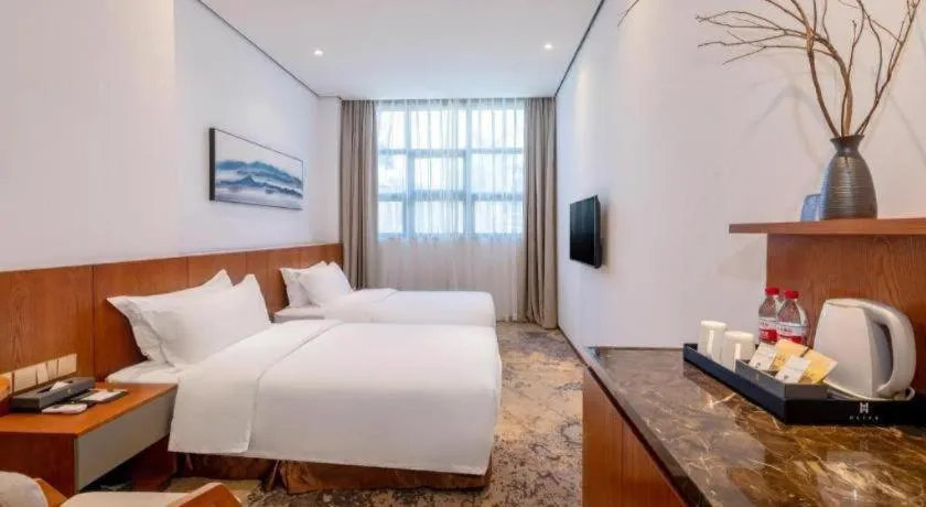 Bed in H Life Hotel (Shenzhen Sea World Branch)