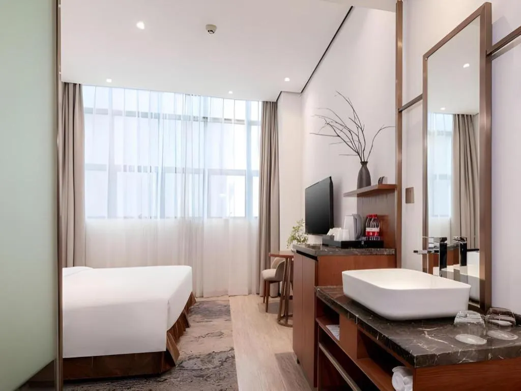 Bed in H Life Hotel (Shenzhen Sea World Branch)