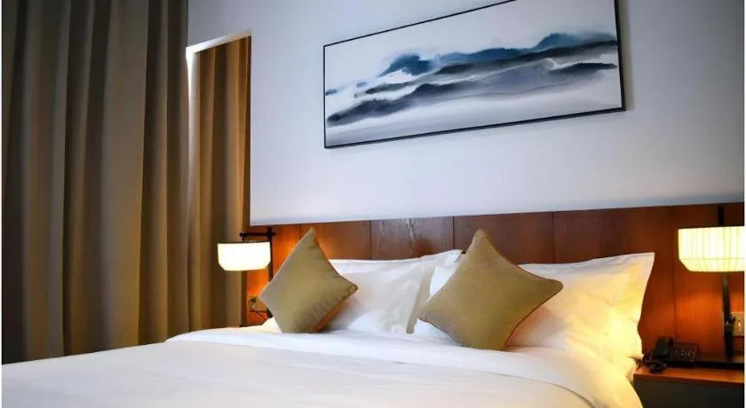 Bed in H Life Hotel (Shenzhen Sea World Branch)