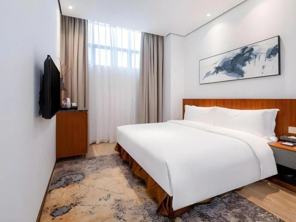Bed in H Life Hotel (Shenzhen Sea World Branch)
