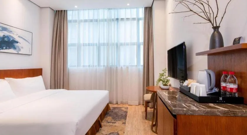 Bed in H Life Hotel (Shenzhen Sea World Branch)