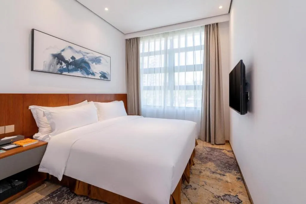 Bed in H Life Hotel (Shenzhen Sea World Branch)