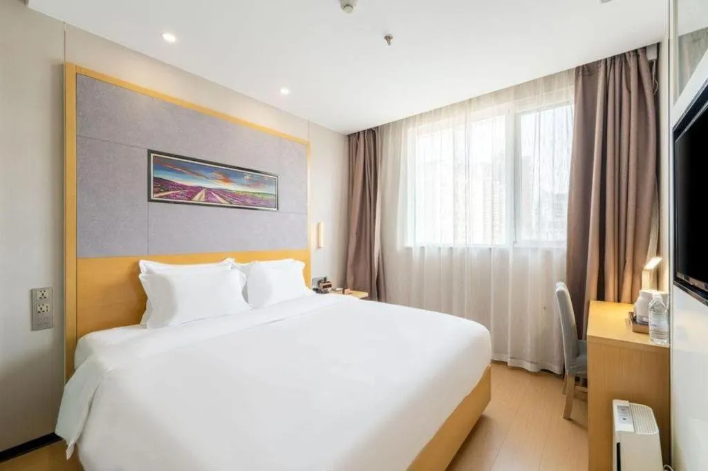 Bed in Lavande Hotel Beijing Guanganmen Lize Commercial Zone