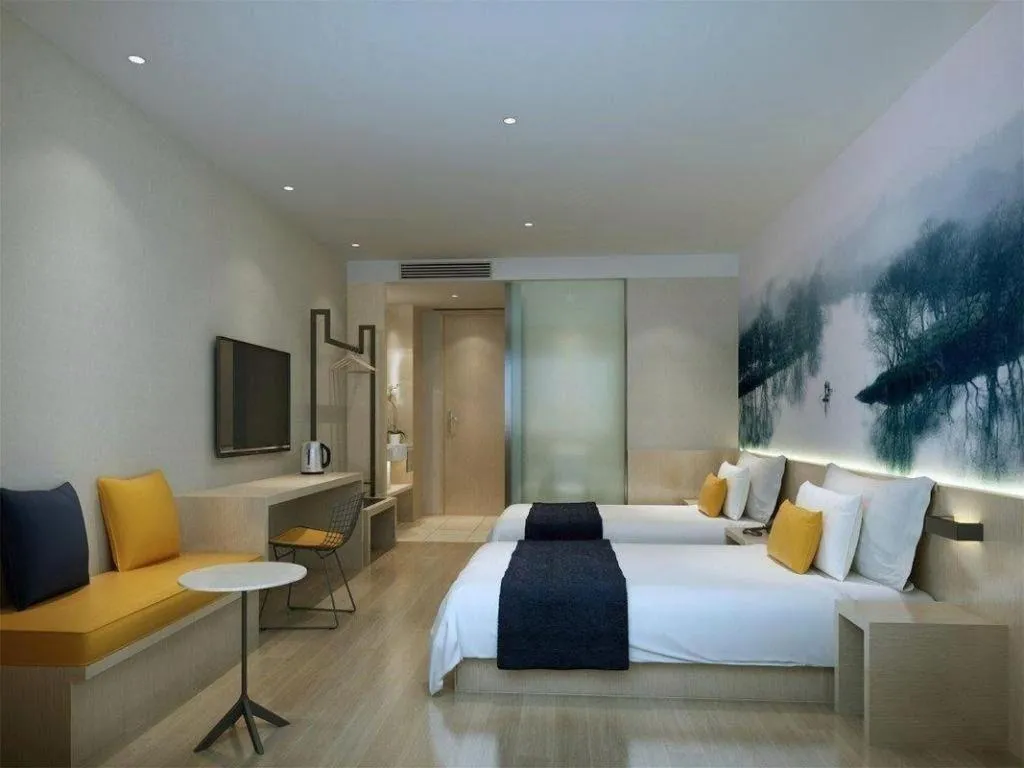 Bed in Ibis Styles Shanghai Qingpu Sports Center Hotel