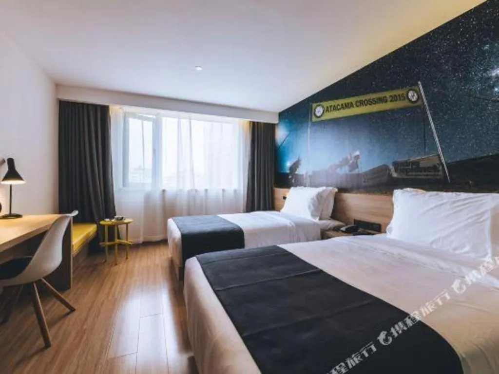 Bed in Ibis Styles Shanghai Qingpu Sports Center Hotel