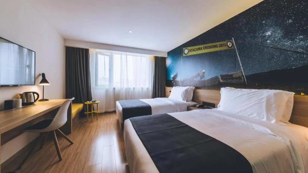 Bed in Ibis Styles Shanghai Qingpu Sports Center Hotel