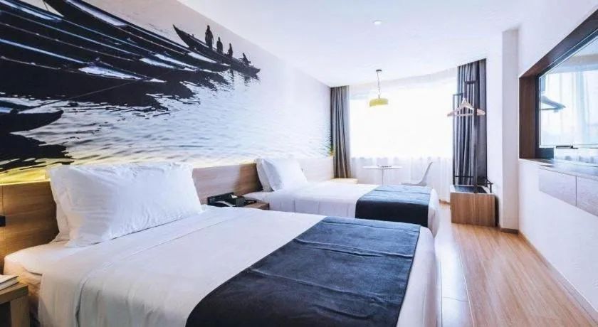 Bed in Ibis Styles Shanghai Qingpu Sports Center Hotel