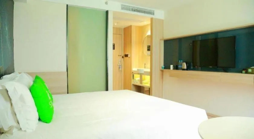 Bed in Ibis Styles Shanghai Qingpu Sports Center Hotel