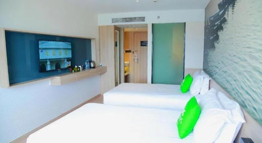 Bed in Ibis Styles Shanghai Qingpu Sports Center Hotel