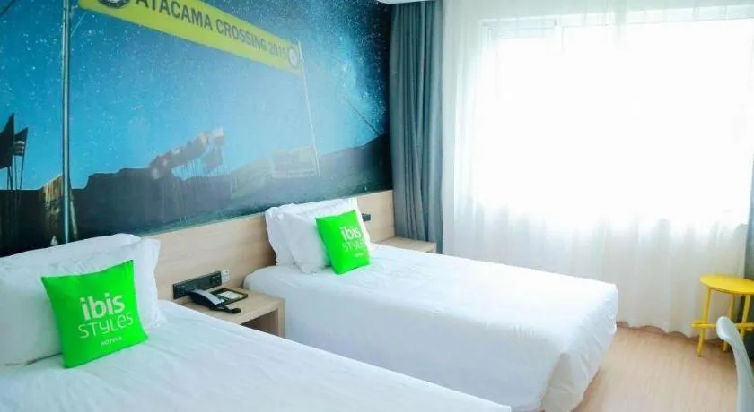 Bed in Ibis Styles Shanghai Qingpu Sports Center Hotel