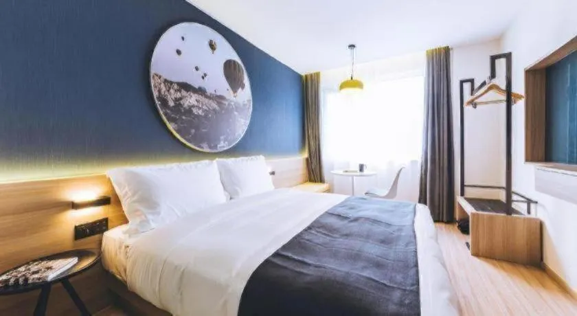 Bed in Ibis Styles Shanghai Qingpu Sports Center Hotel