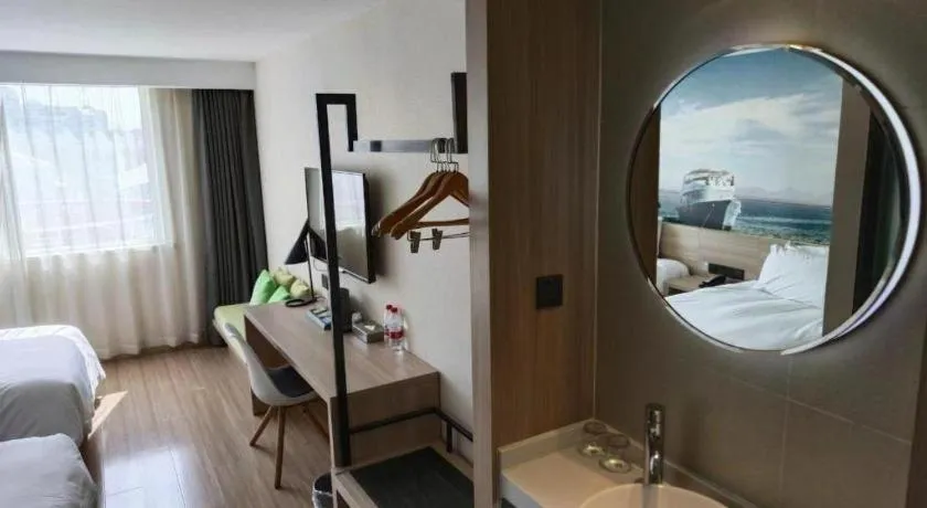 Bed in Ibis Styles Shanghai Qingpu Sports Center Hotel