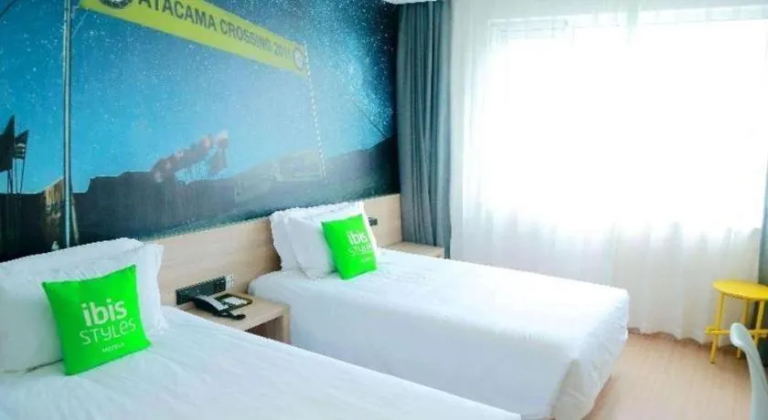Bed in Ibis Styles Shanghai Qingpu Sports Center Hotel