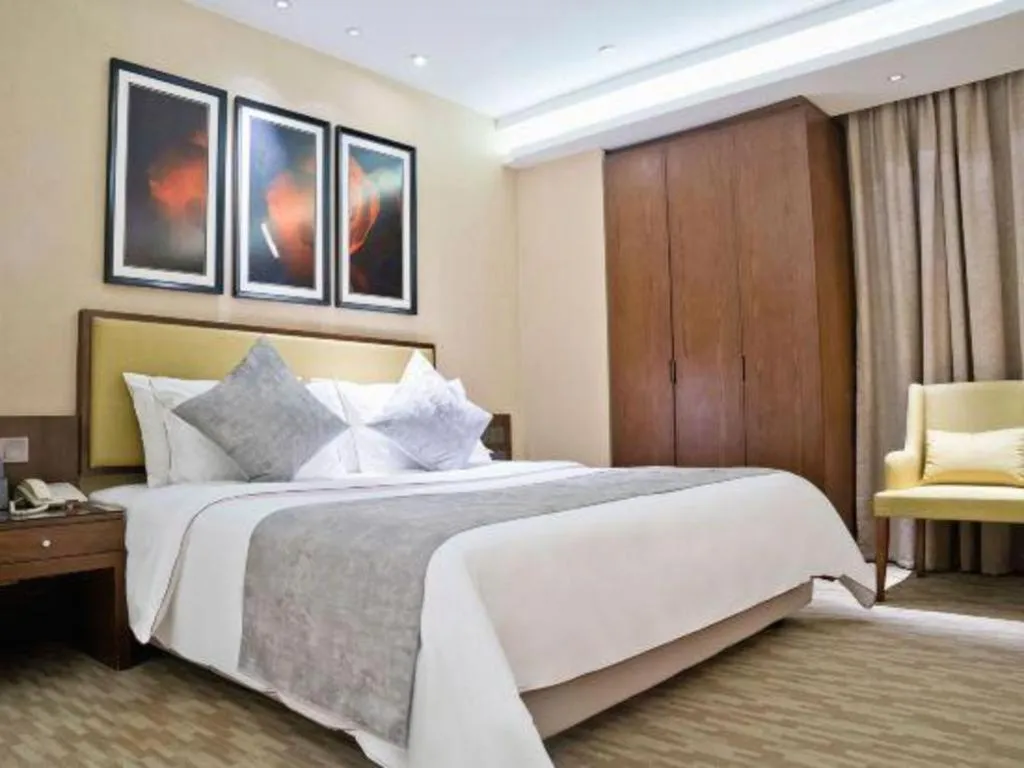 Bed in New Regent Hotel