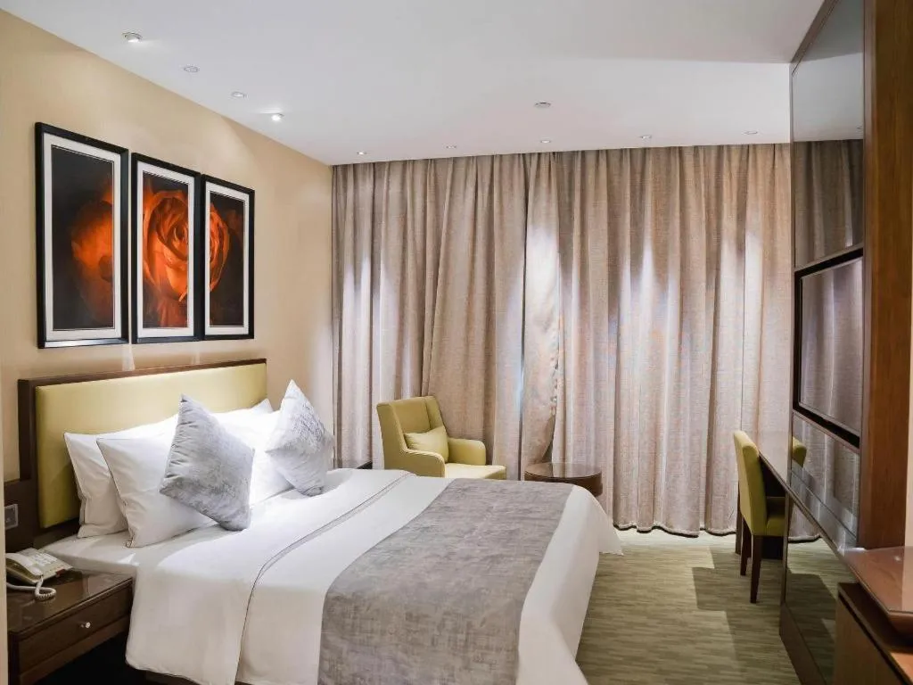 Bed in New Regent Hotel