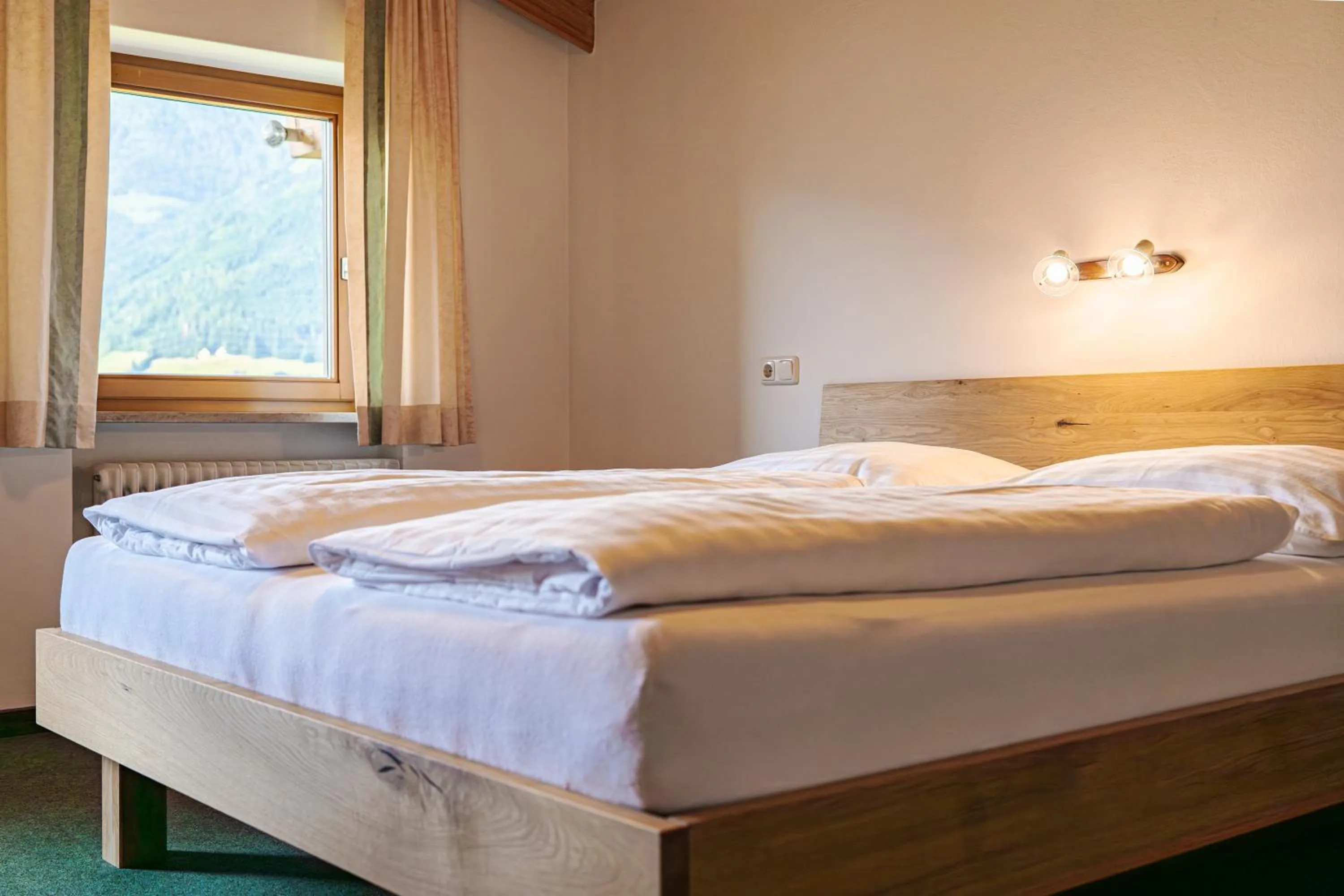 Photo of the whole room, Bed in Pension Schlossberg