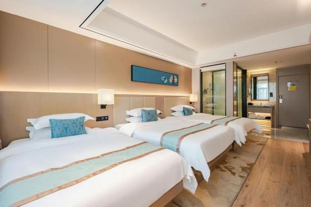 Bed in GreenTree Eastern Dali Railway Station Hotel