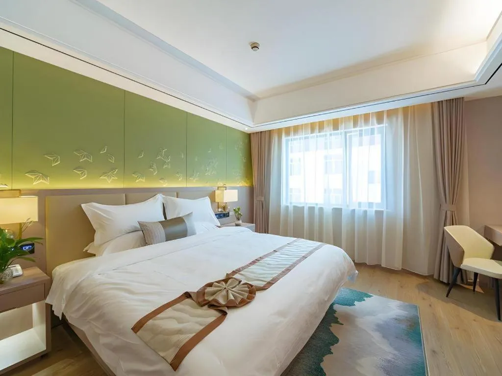 Bed in GreenTree Eastern Dali Railway Station Hotel