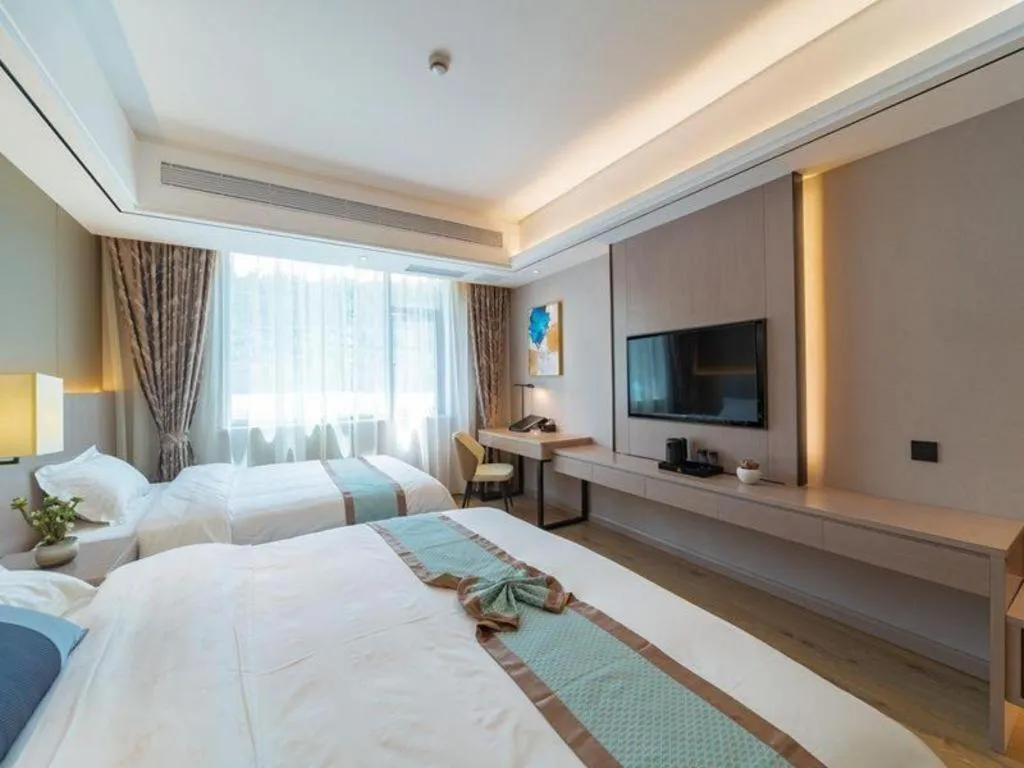 Bed in GreenTree Eastern Dali Railway Station Hotel