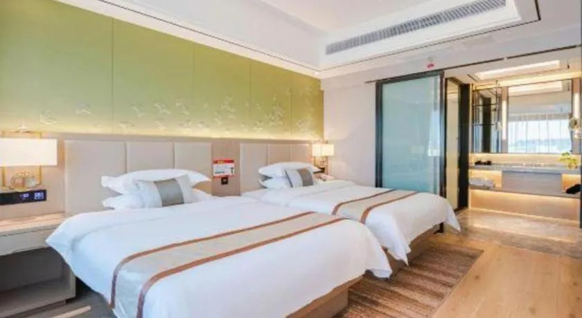 Bed in GreenTree Eastern Dali Railway Station Hotel