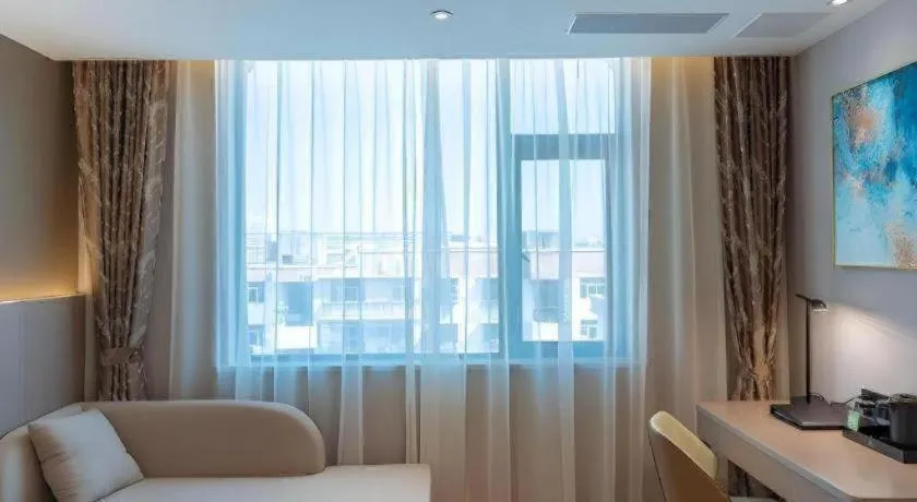 Bed in GreenTree Eastern Dali Railway Station Hotel