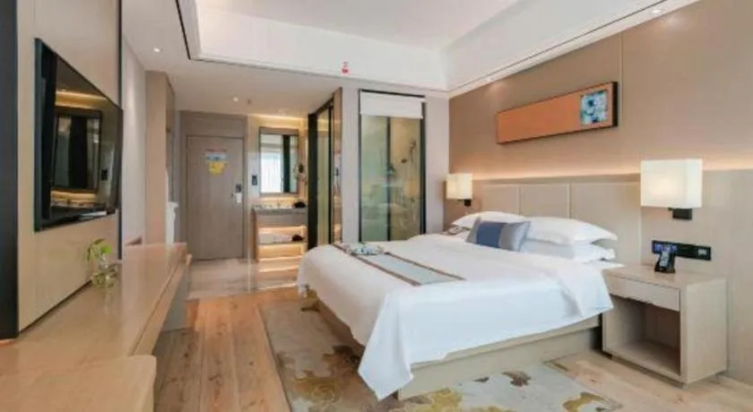 Bed in GreenTree Eastern Dali Railway Station Hotel