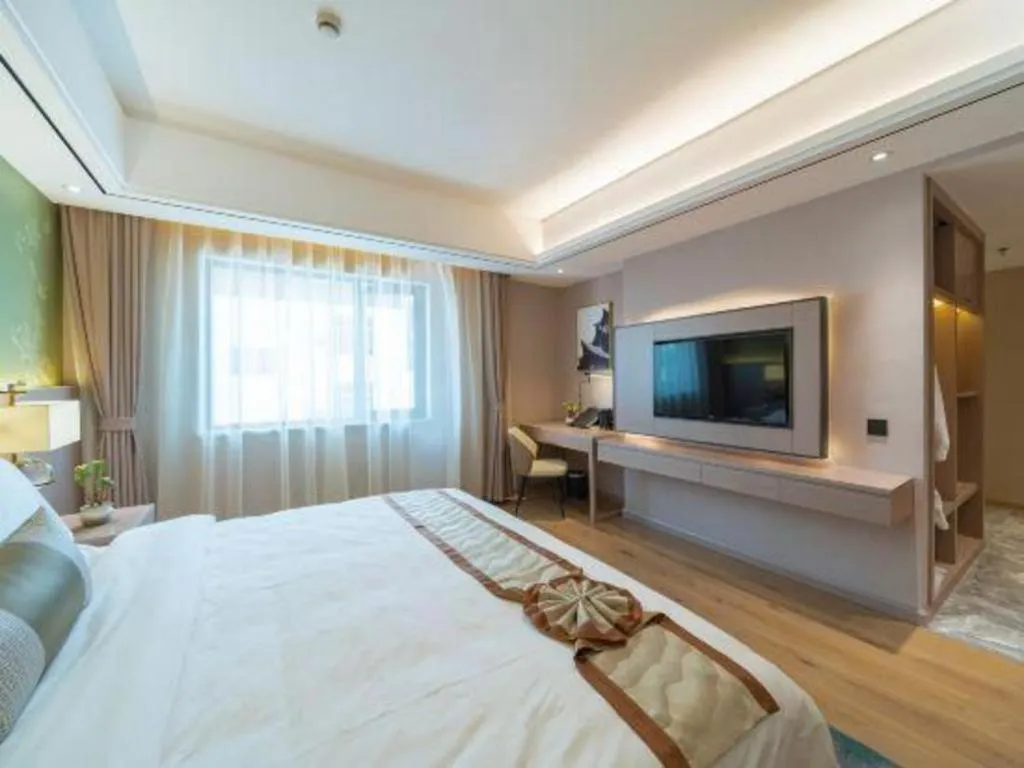 Bed in GreenTree Eastern Dali Railway Station Hotel