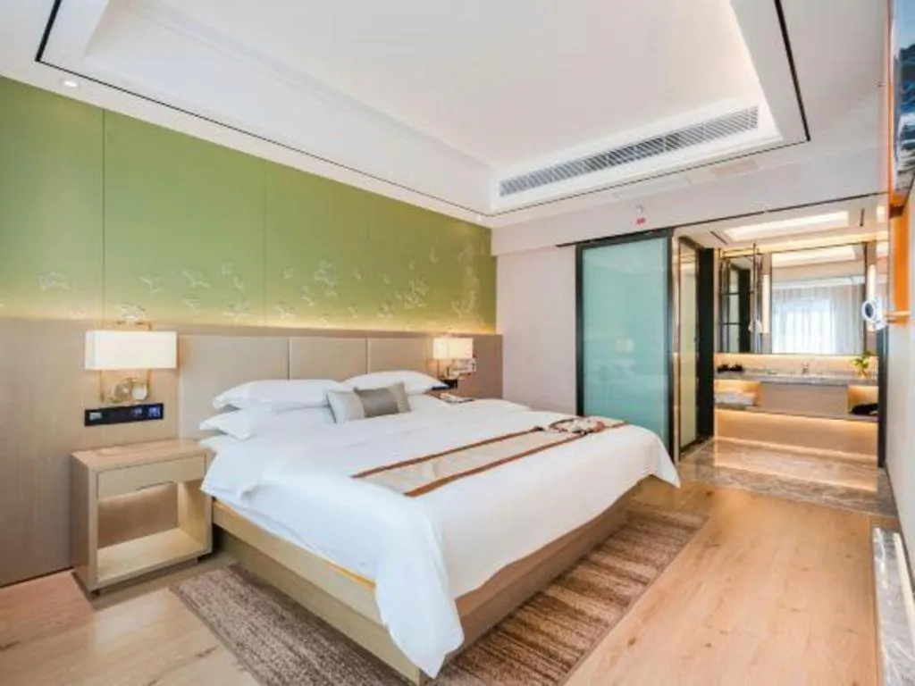 Bed in GreenTree Eastern Dali Railway Station Hotel