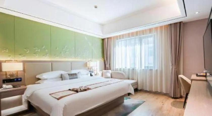 Bed in GreenTree Eastern Dali Railway Station Hotel