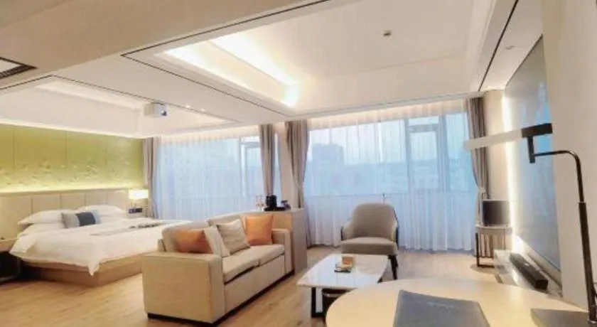 Bed in GreenTree Eastern Dali Railway Station Hotel