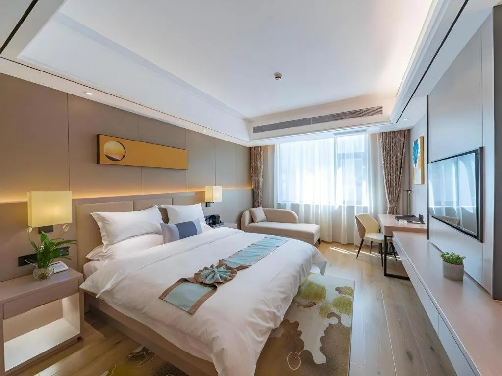 Bed in GreenTree Eastern Dali Railway Station Hotel