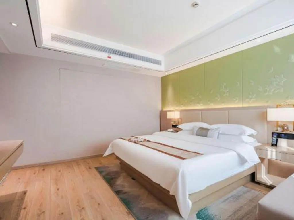 Bed in GreenTree Eastern Dali Railway Station Hotel