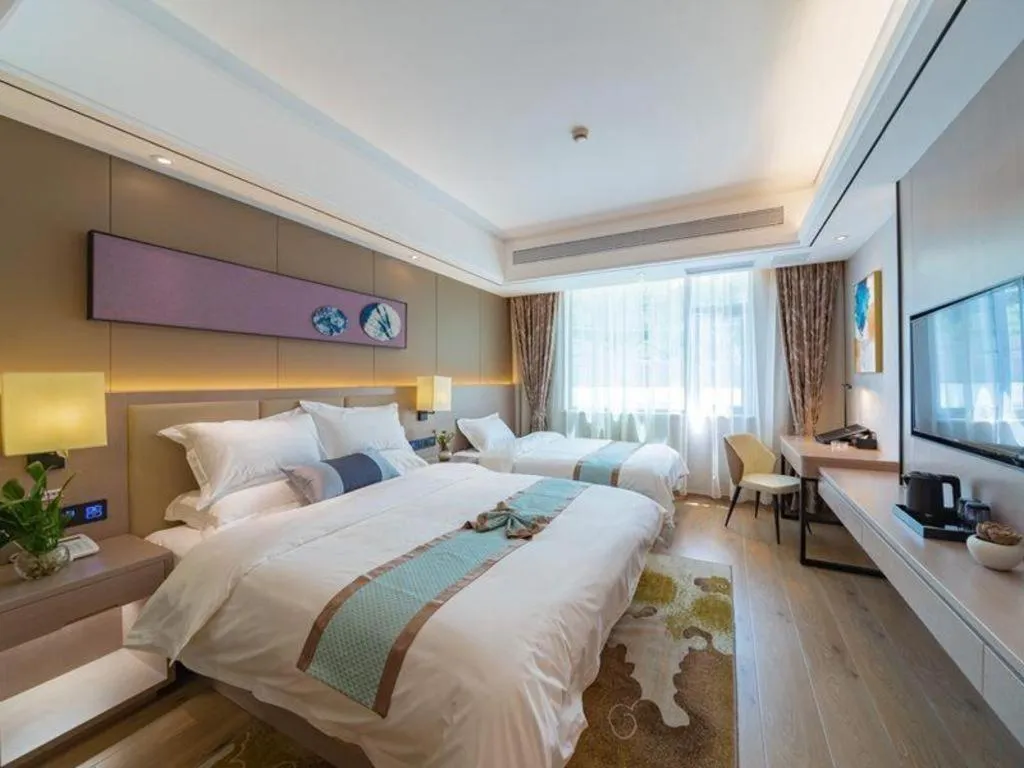 Bed in GreenTree Eastern Dali Railway Station Hotel