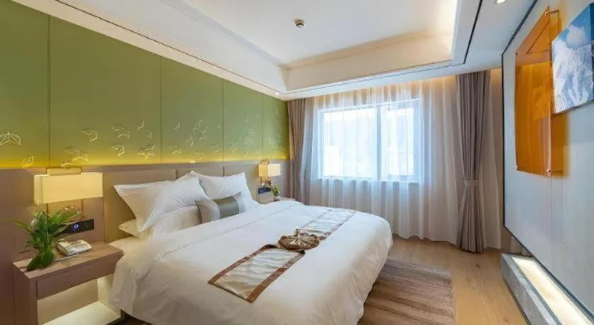 Bed in GreenTree Eastern Dali Railway Station Hotel