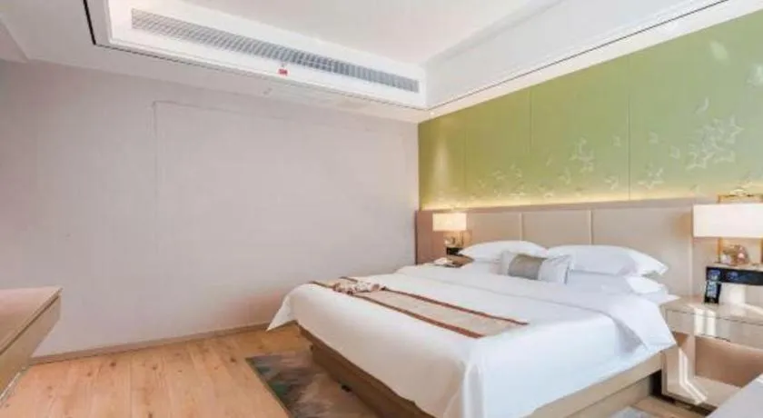 Bed in GreenTree Eastern Dali Railway Station Hotel