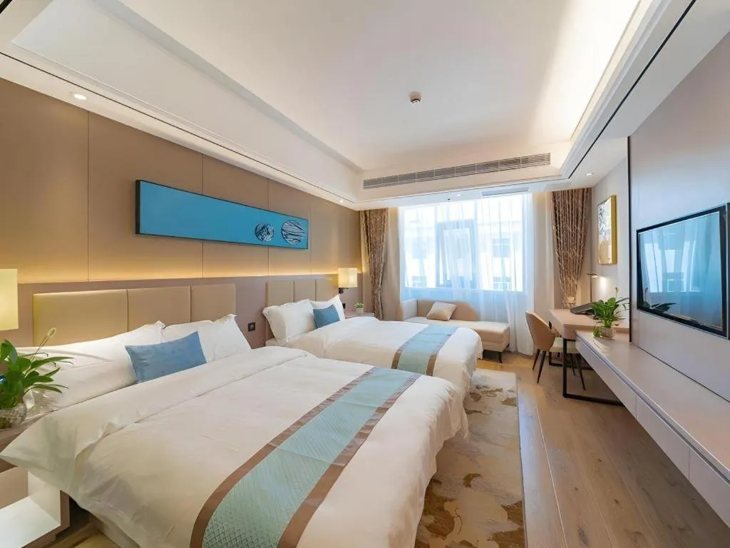 Bed in GreenTree Eastern Dali Railway Station Hotel