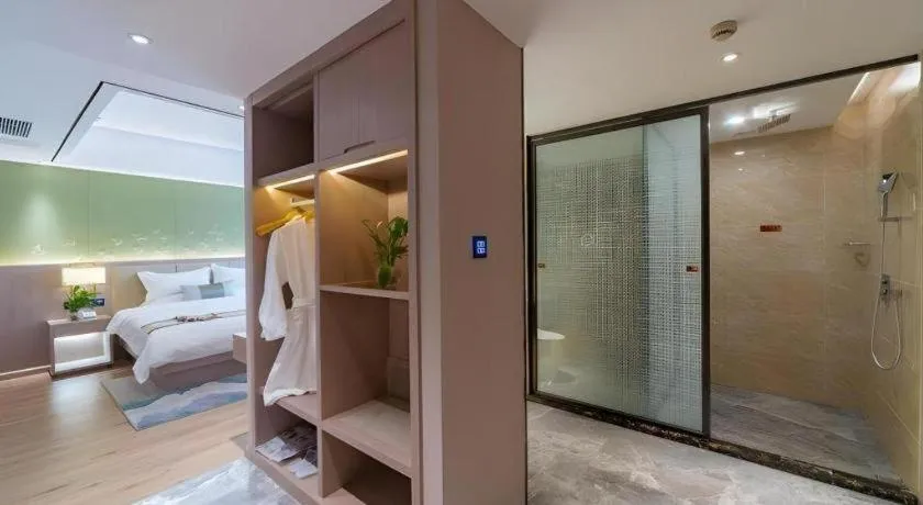 Bed in GreenTree Eastern Dali Railway Station Hotel